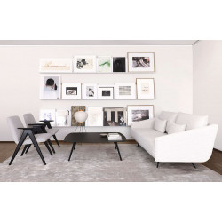 Sofa Costura von Stua mit Stuhl Libera von Stua sowie Tisch Solapa von Stua im Innenbereich